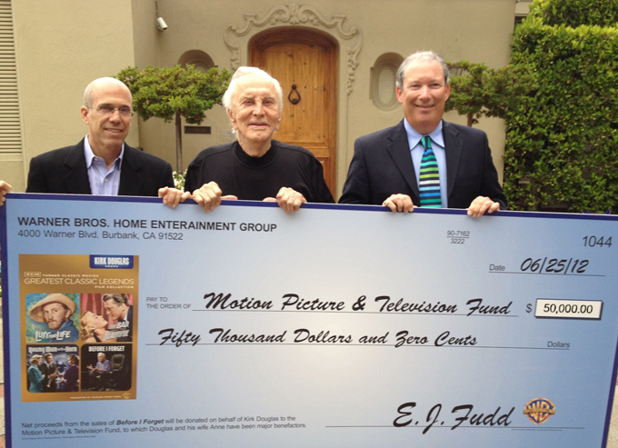 Douglas accepting check
