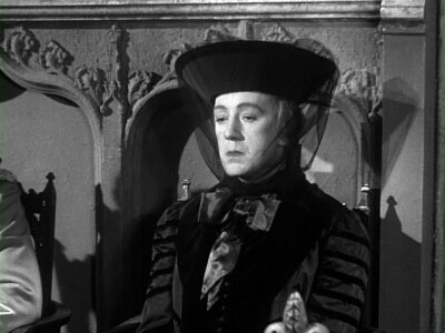 Alec Guinness as Lady Agatha D'Ascoyne