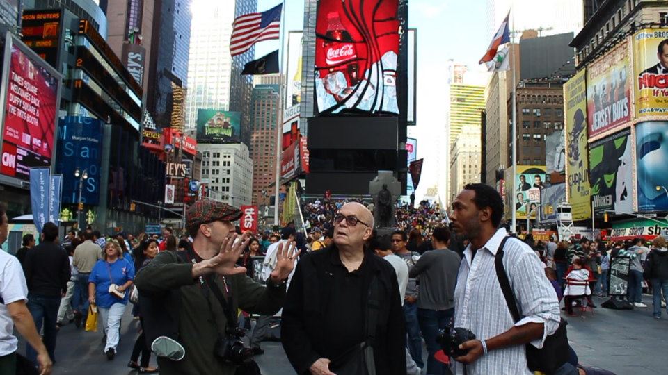 Filmmakers JJ Garvine & Tai Parquet directing Bob in Times Square.